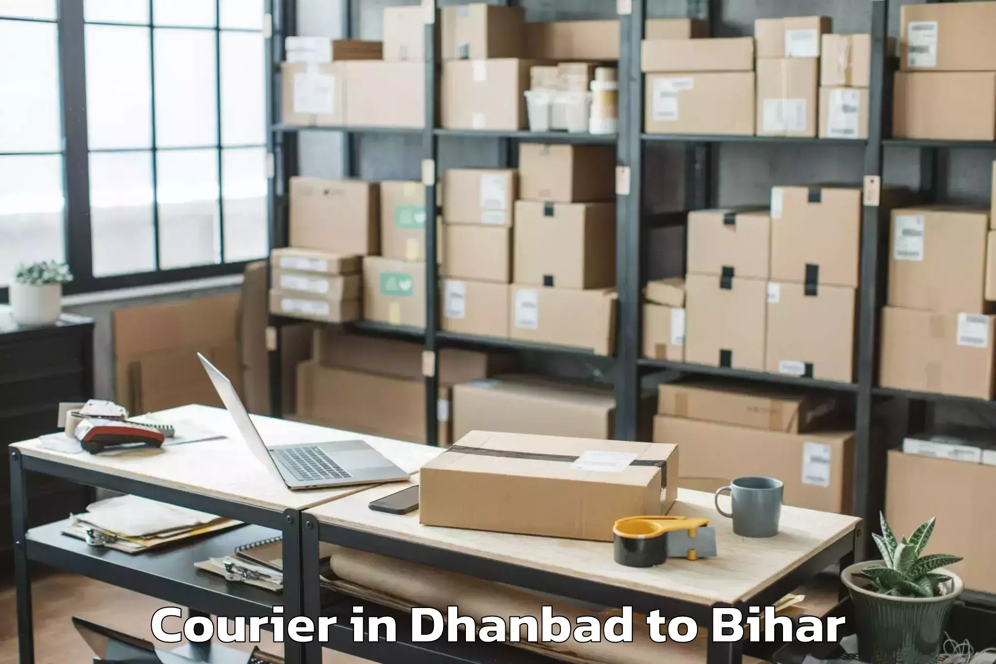 Affordable Dhanbad to Bairgania Courier